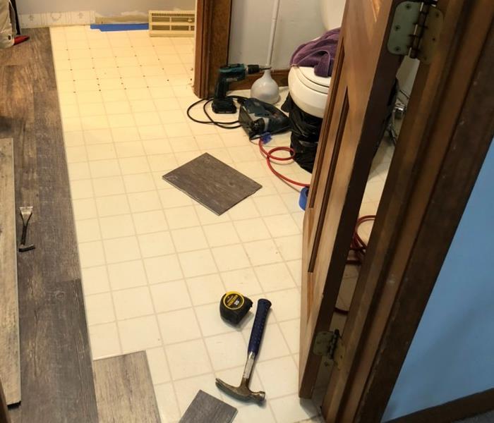 Floor in bathroom before remodel 